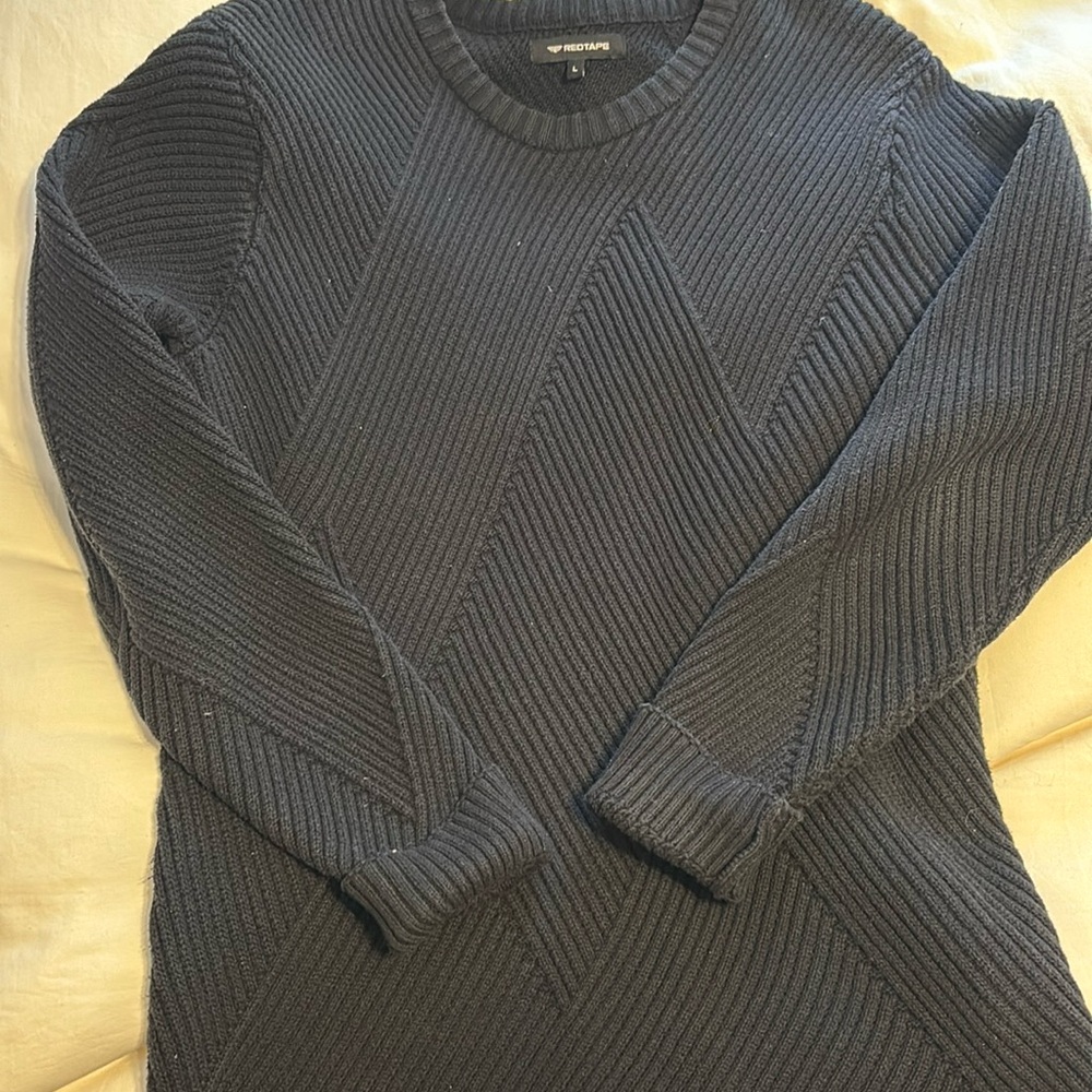 Cozy black chunky large Redtape sweater.